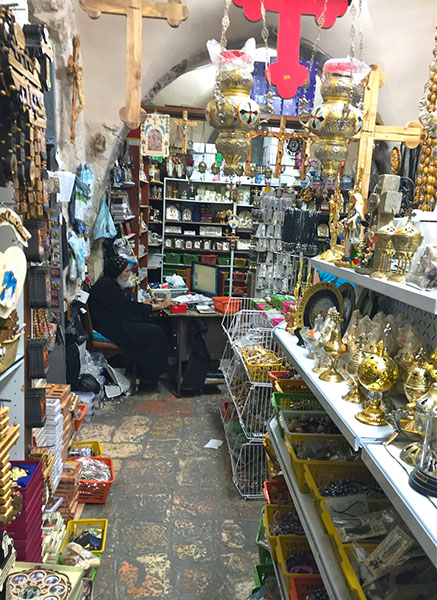 Coptic monk with trinkets Jerusalem