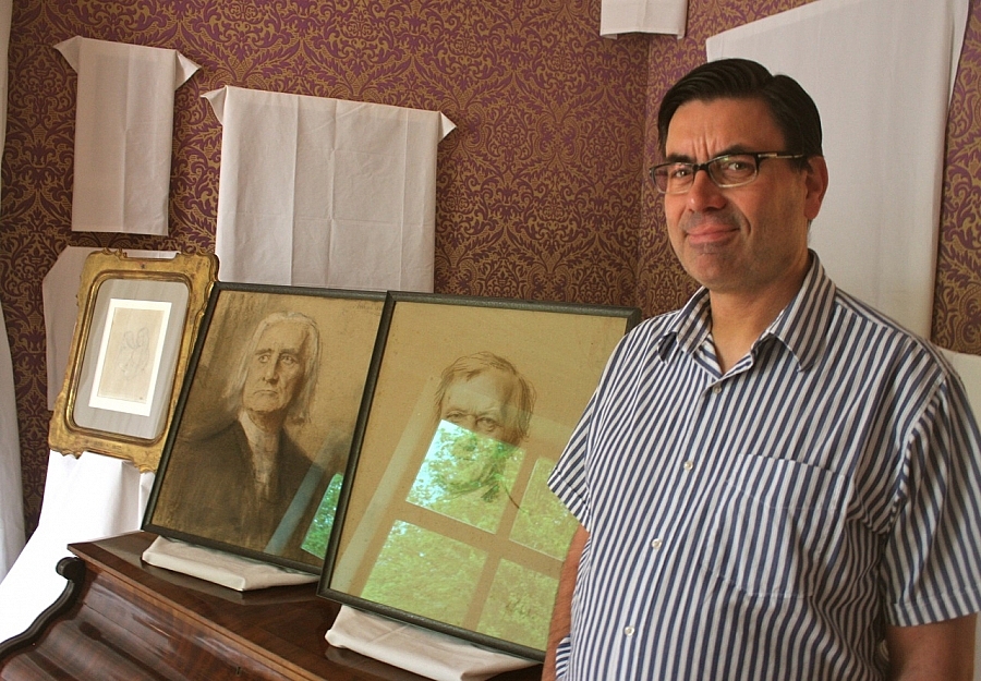 Museum director Sven Friedrich at Villa Wahnfried with Liszt and Wagner portraits. Photo: Ehrnrooth